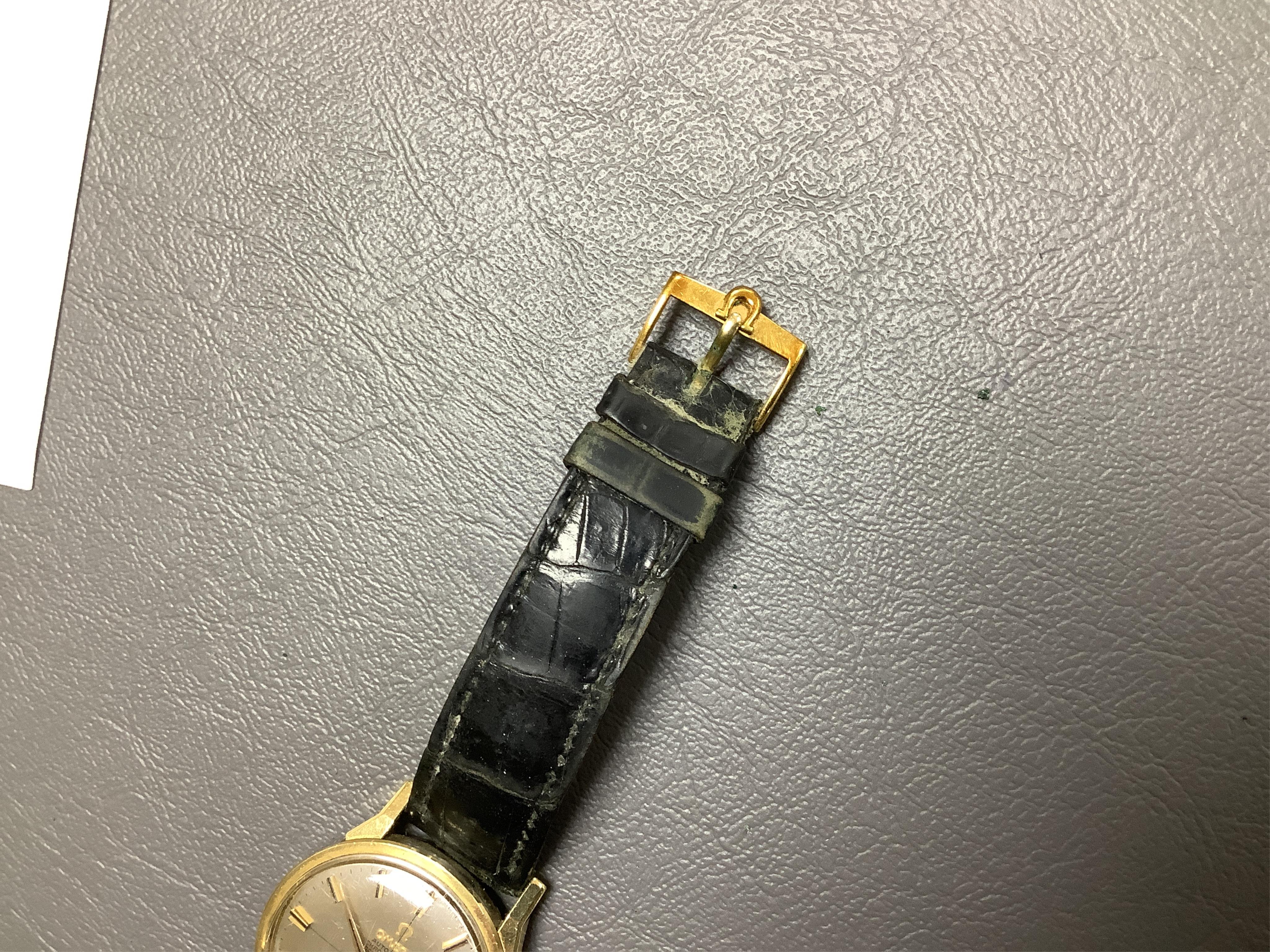 A gentleman's 1960's? steel and gold plated Omega Constellation Automatic Chronometer wrist watch, with baton numerals and date aperture, case diameter 35mm, on a leather strap with Omega gold plated buckle, no box or pa